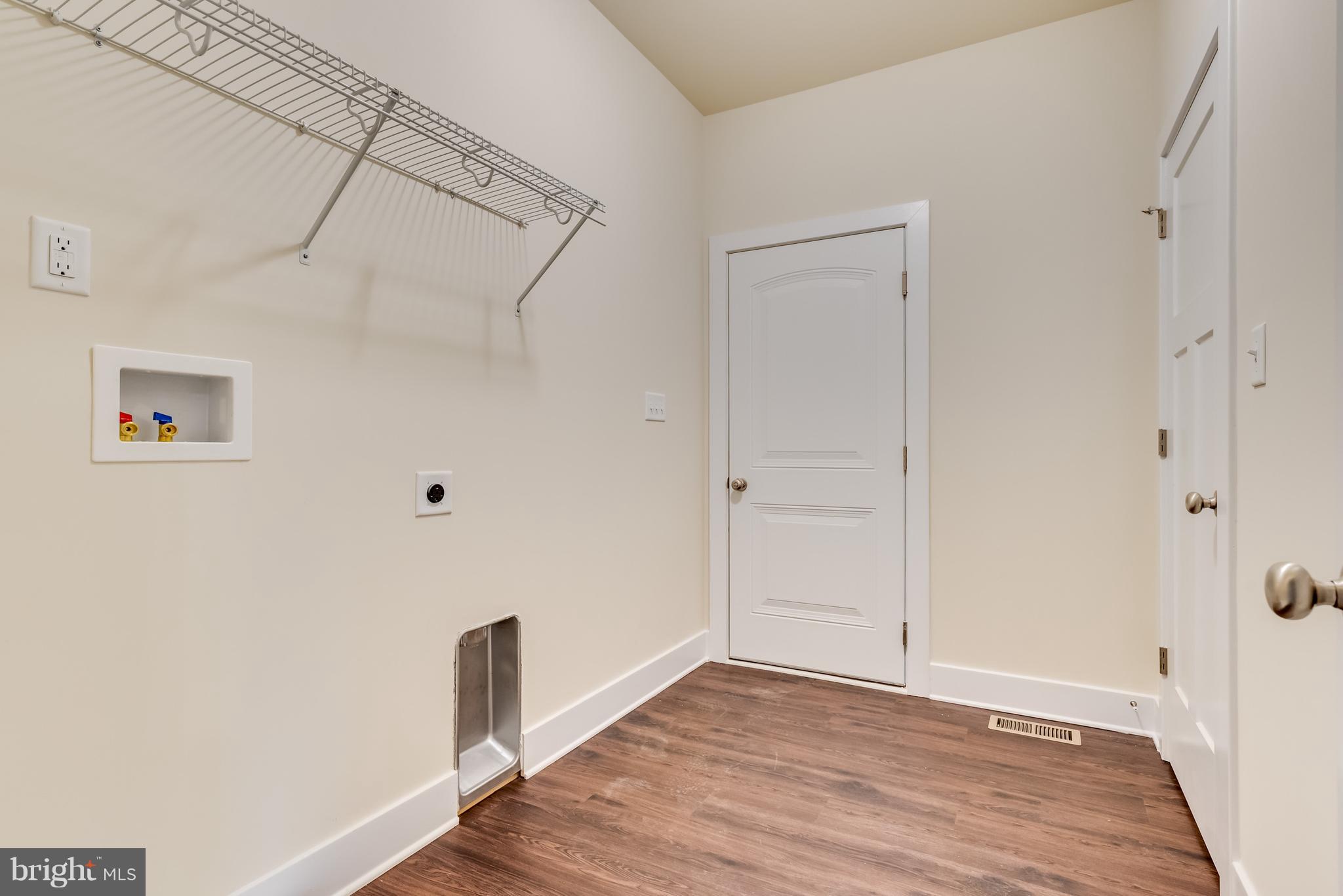 1260 Riparian Drive Falling Waters, WV 25419 - Photo 23 of 36 Main floor laundry and mud room