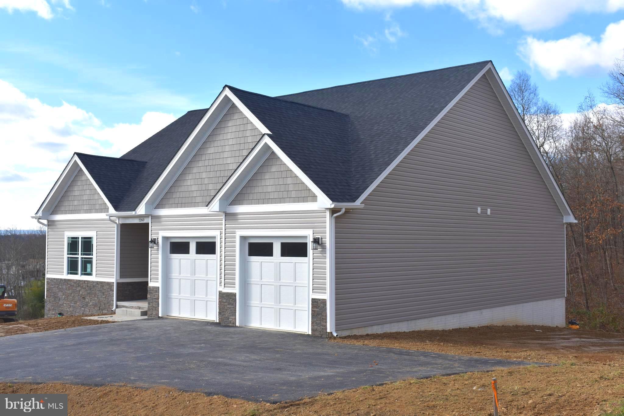 1260 Riparian Drive Falling Waters, WV 25419 - Photo 33 of 36 There is an additional parking pad.