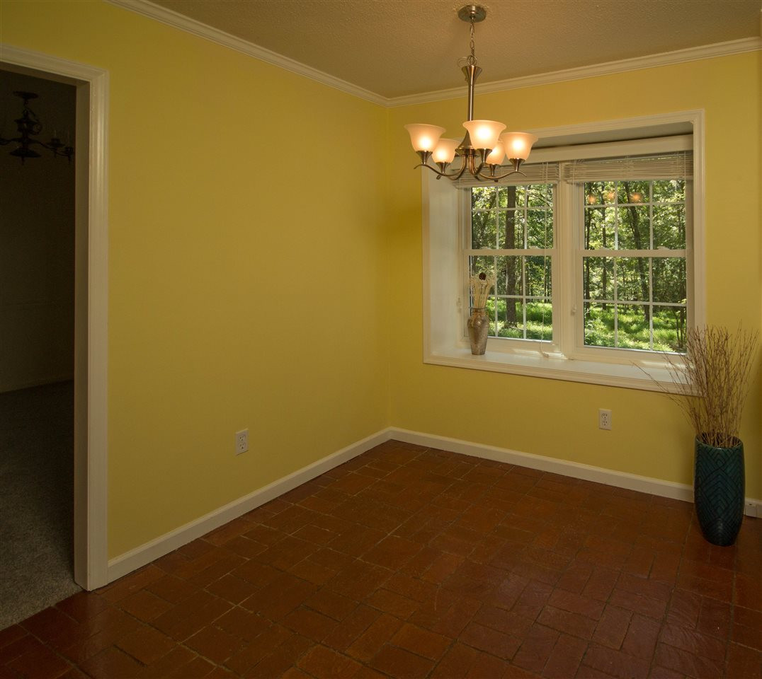 7626 Herndon Road Durham, NC 27713 - Photo 13 of 25 The Breakfast area has a new lighting fixture. Watch and enjoy the wildlife from the double window. Breakfast Area