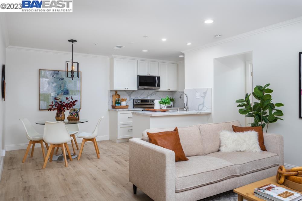 1310 Walden Road, Unit 1 Walnut Creek, CA 94597 - Photo 1 of 1 a living room with furniture and a potted plant