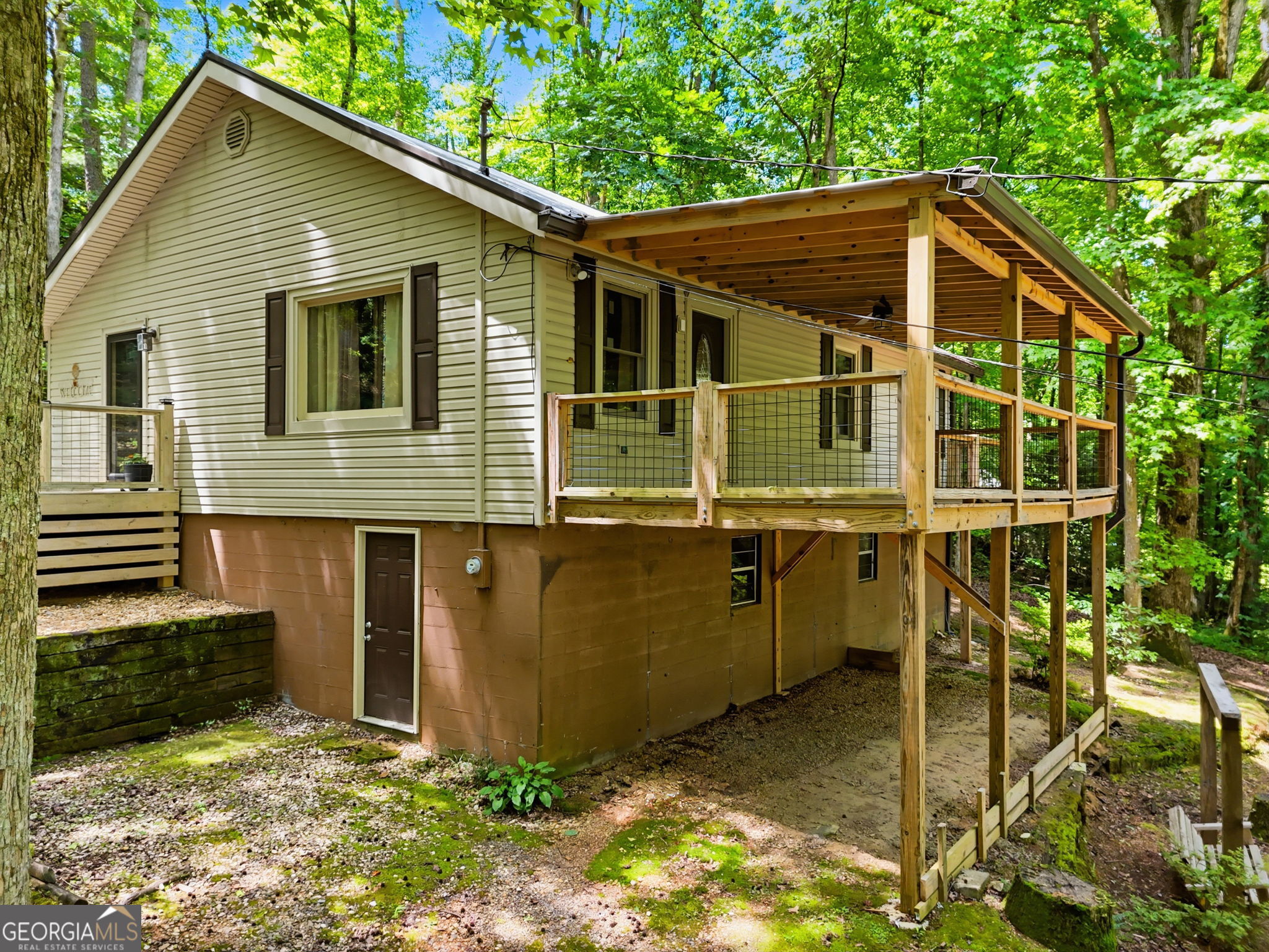 629 Goose Island Road Cherry Log, GA 30522 - Photo 49 of 52 a view of backyard of house with wooden fence
