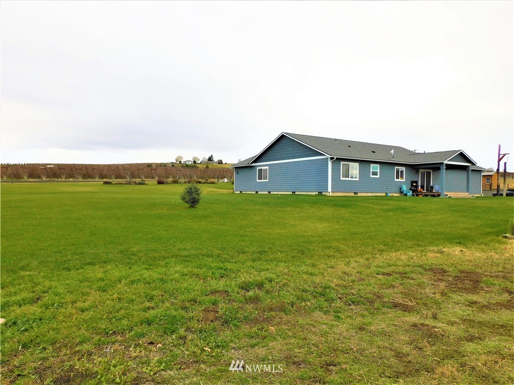 231 Sharp Road Tieton, WA 98947 - Photo 21 of 27 a view of a house with a big yard