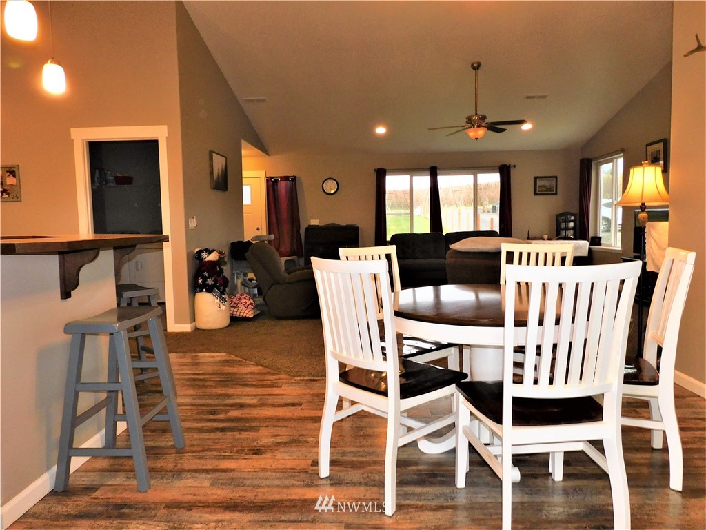231 Sharp Road Tieton, WA 98947 - Photo 8 of 27 a view of a dining room with furniture and wooden floor