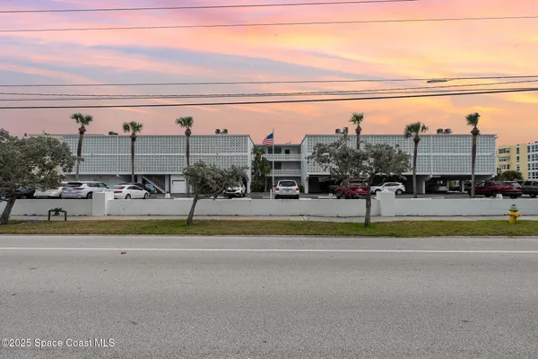 a picture of a book and a bed