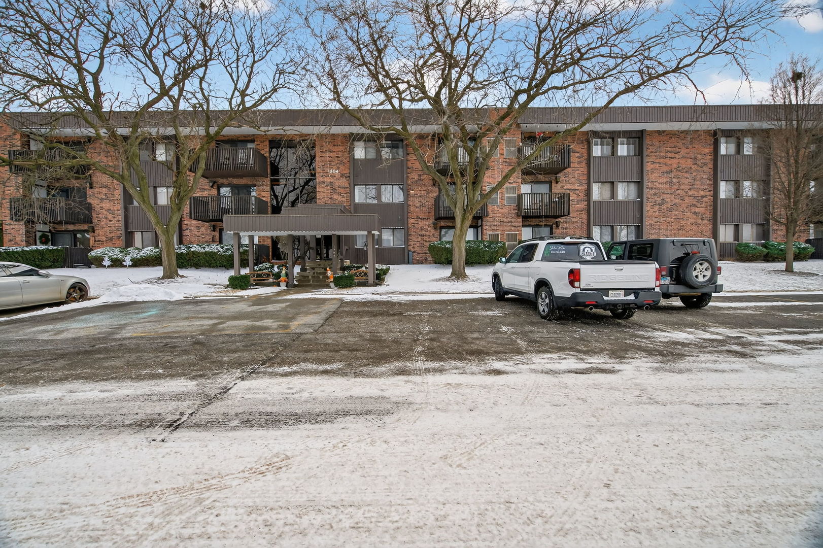 1504 Woodbridge Road, Unit 1A Joliet, IL 60436 - Photo 1 of 32 a building view