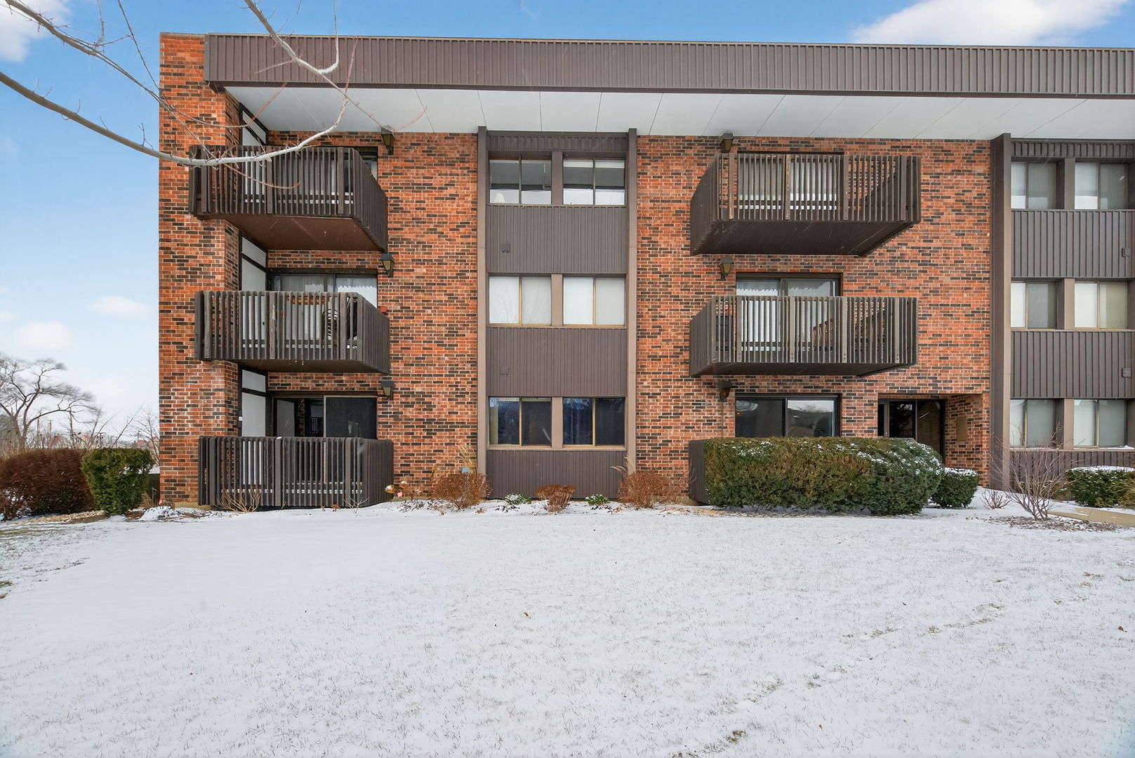 1504 Woodbridge Road, Unit 1A Joliet, IL 60436 - Photo 30 of 34 a view of a house with a yard