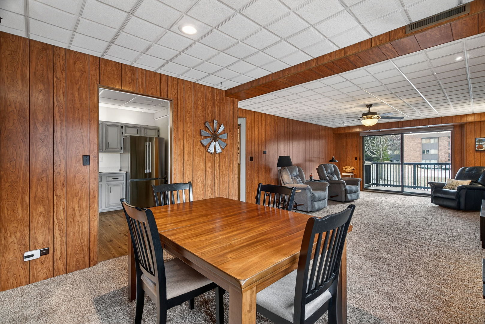 1504 Woodbridge Road, Unit 1A Joliet, IL 60436 - Photo 6 of 32 a dining room with furniture and window