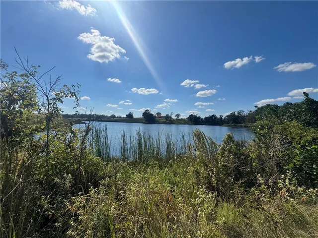a view of a lake in middle of the house
