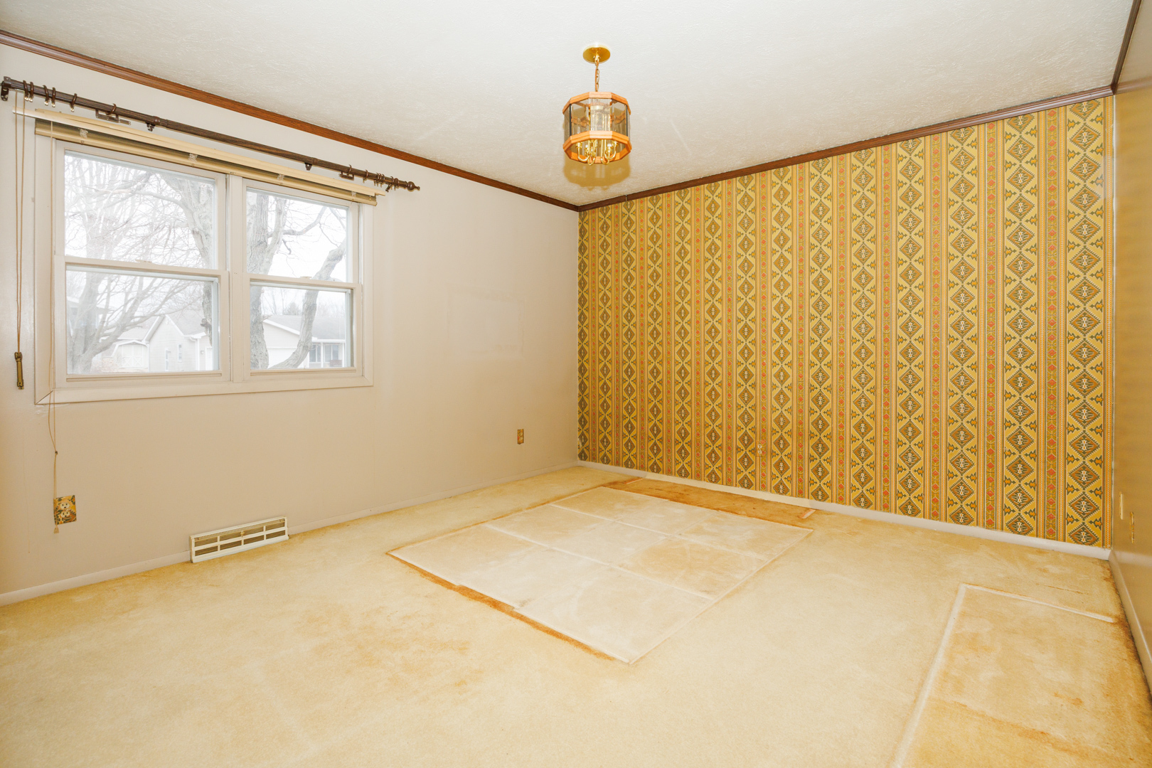 103 Cheltenham Drive Normal, IL 61761 - Photo 12 of 47 a view of an empty room with a window