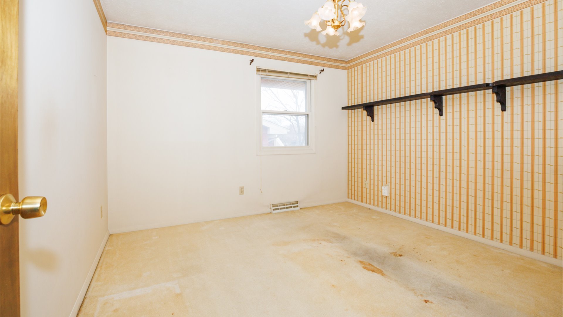 103 Cheltenham Drive Normal, IL 61761 - Photo 15 of 47 a view of an empty room with a window