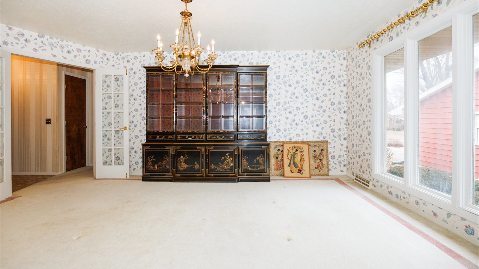 103 Cheltenham Drive Normal, IL 61761 - Photo 21 of 47 a view of a hallway with a chandelier