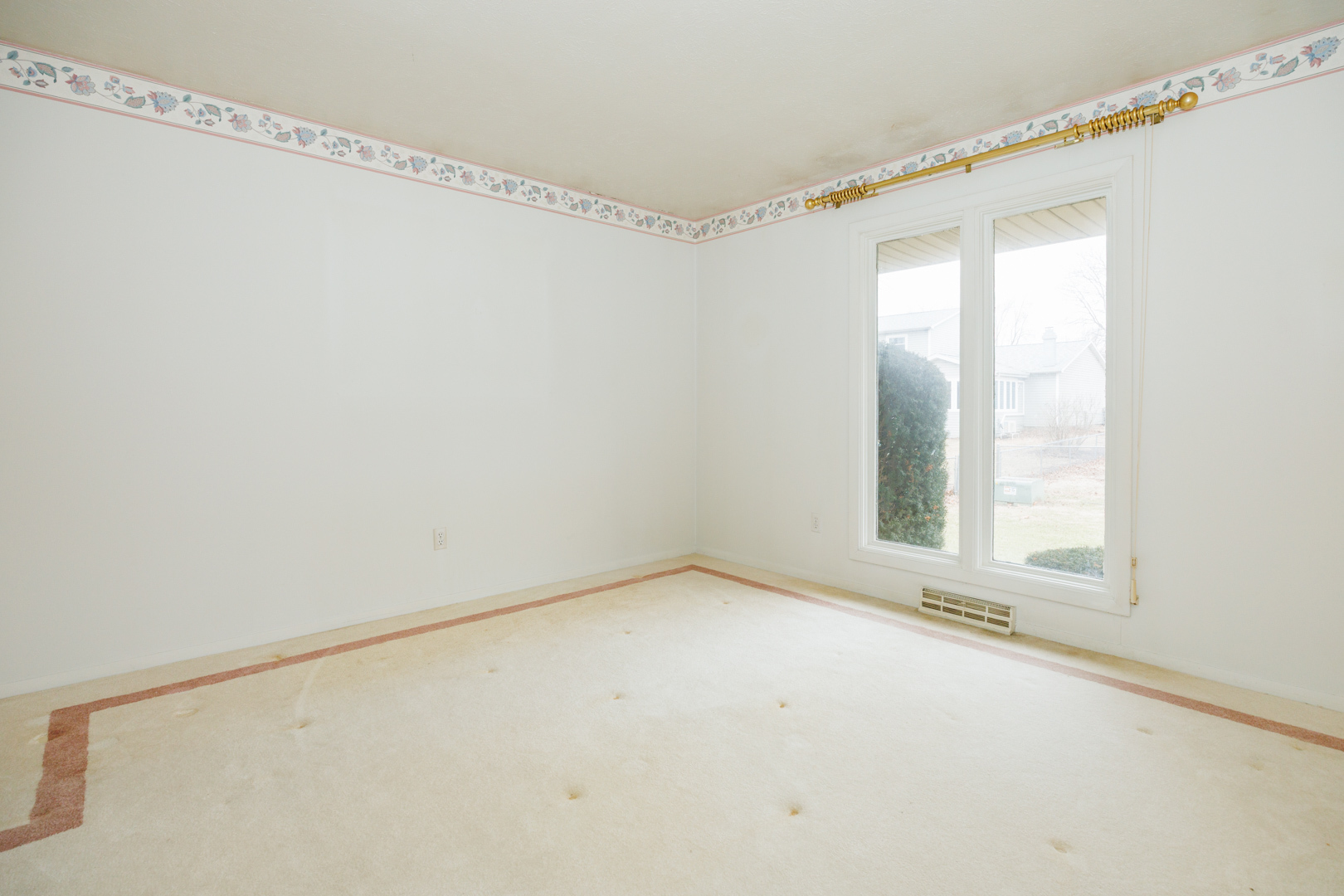 103 Cheltenham Drive Normal, IL 61761 - Photo 25 of 47 a view of an empty room with a window