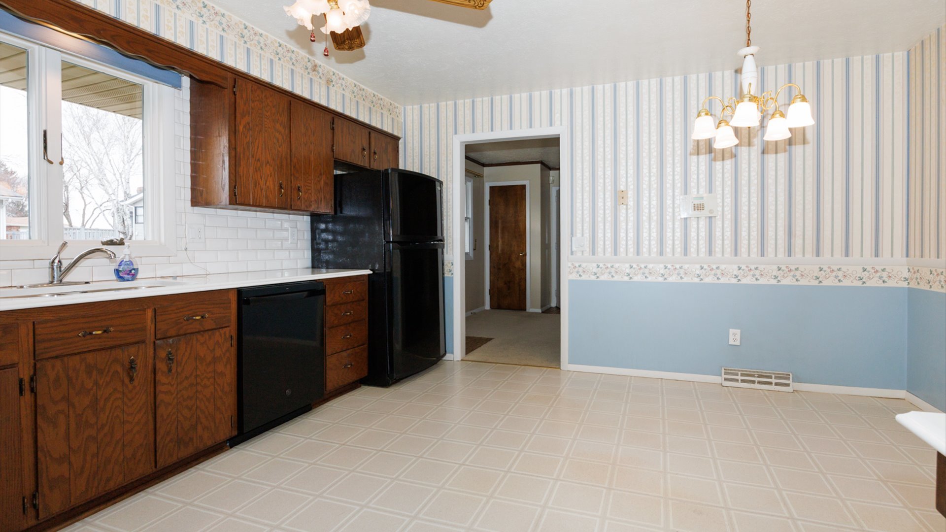 103 Cheltenham Drive Normal, IL 61761 - Photo 27 of 47 a kitchen with stainless steel appliances granite countertop a refrigerator and a sink