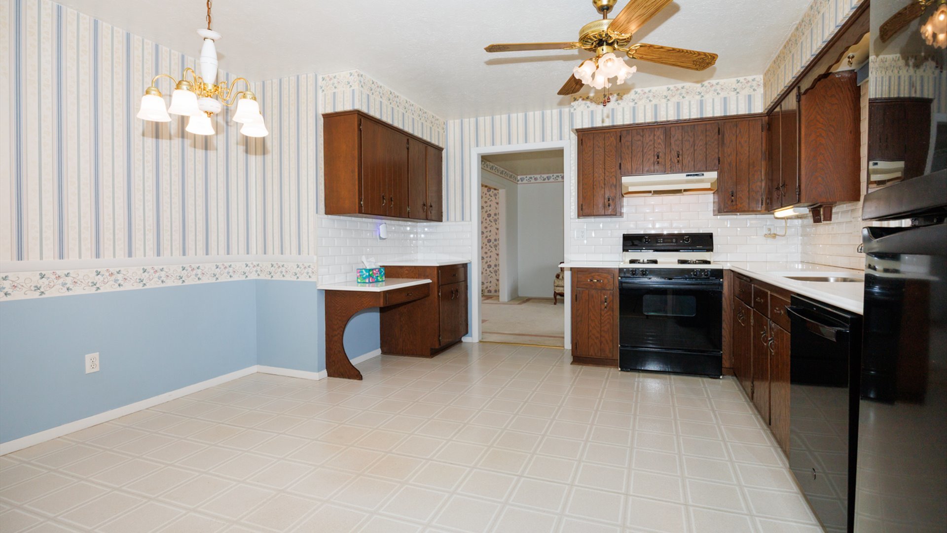 103 Cheltenham Drive Normal, IL 61761 - Photo 28 of 47 a kitchen with stainless steel appliances granite countertop a stove top oven a sink dishwasher and a microwave oven with cabinets