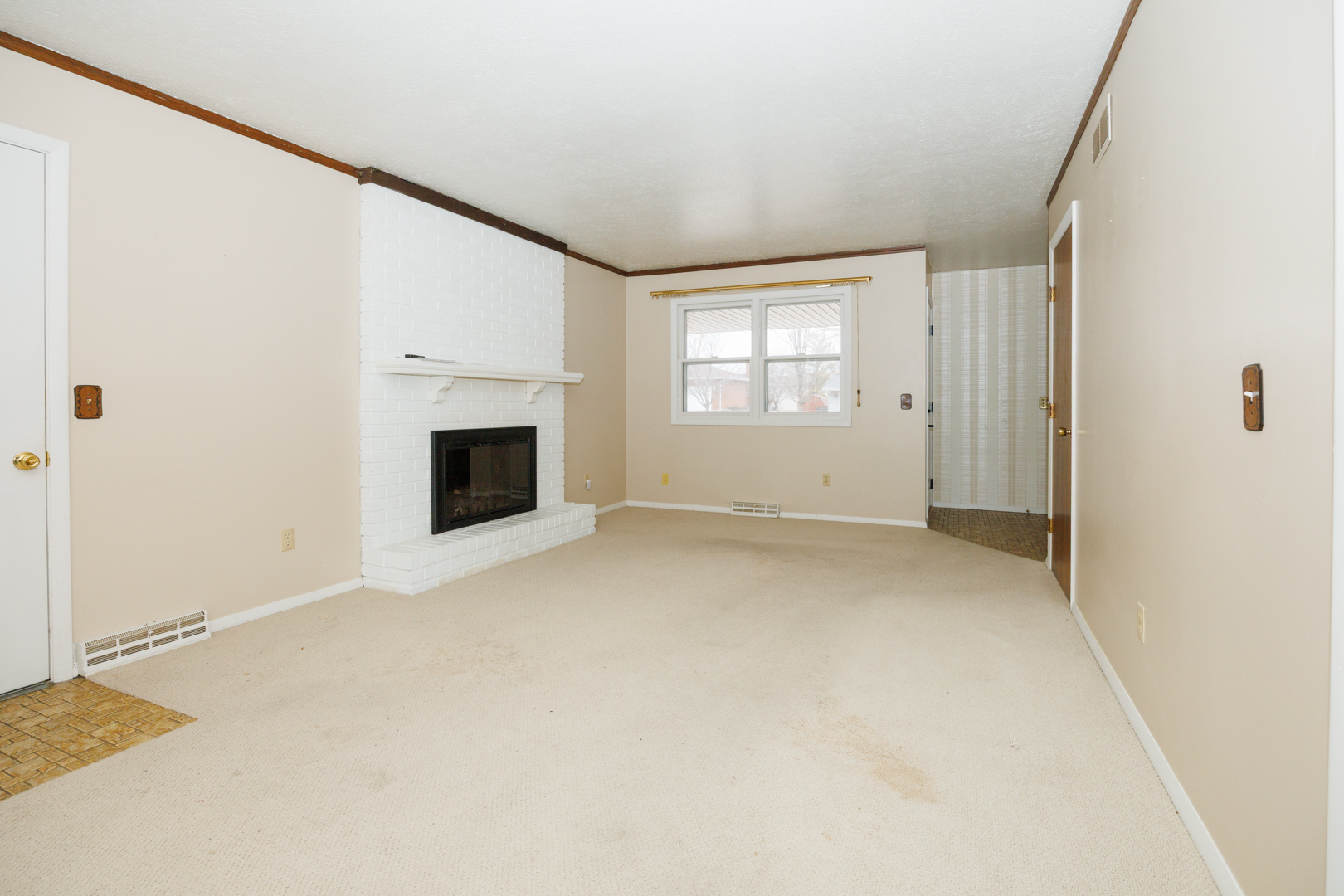 103 Cheltenham Drive Normal, IL 61761 - Photo 32 of 47 a view of empty room with fireplace