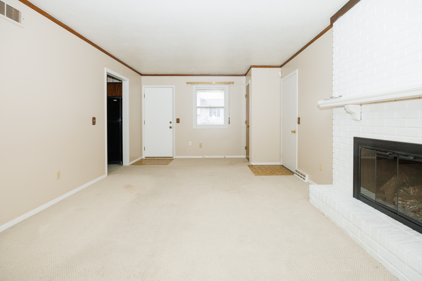 103 Cheltenham Drive Normal, IL 61761 - Photo 34 of 47 a view of empty room with window and fireplace