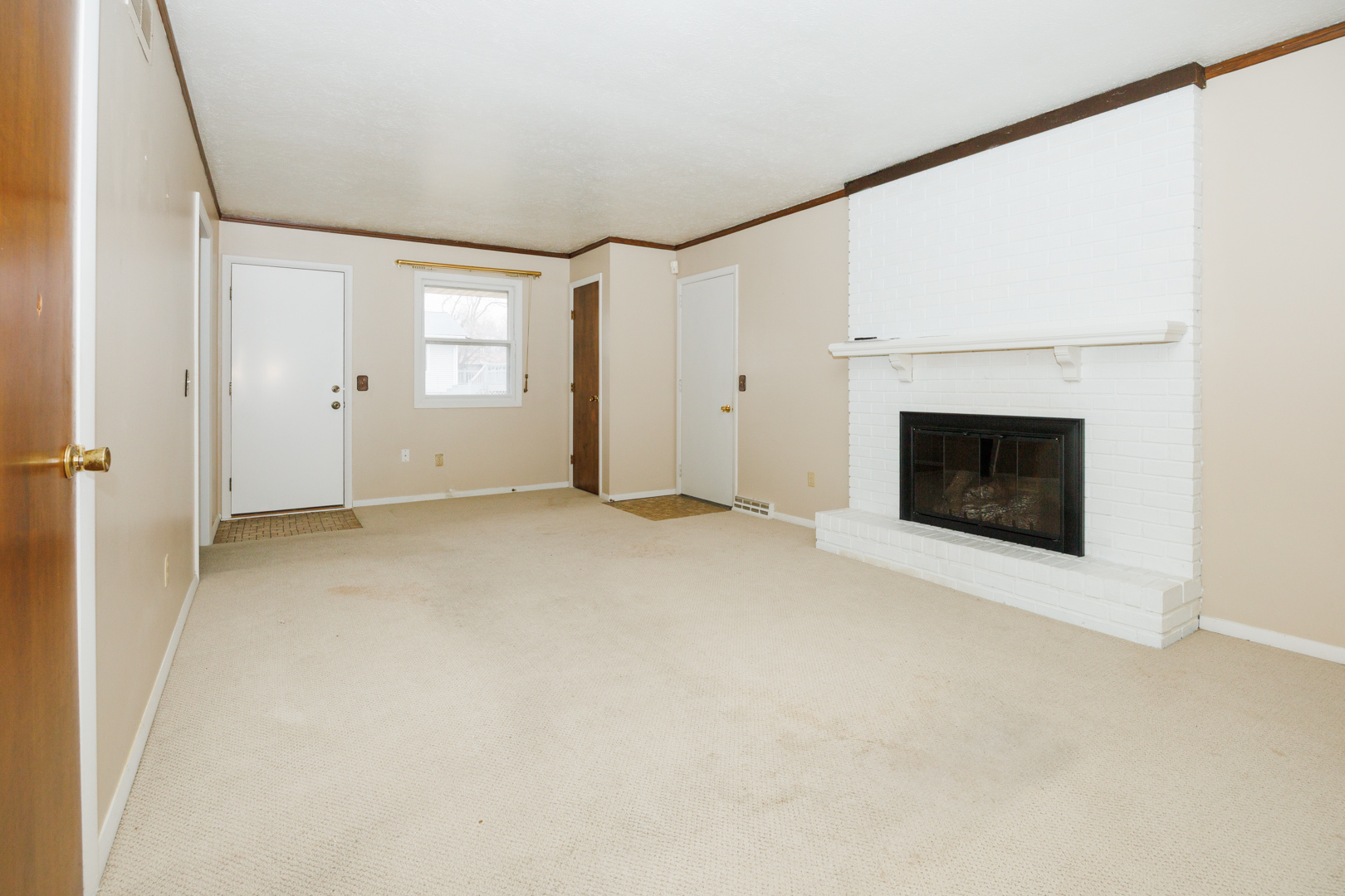103 Cheltenham Drive Normal, IL 61761 - Photo 35 of 47 a view of empty room with a fireplace