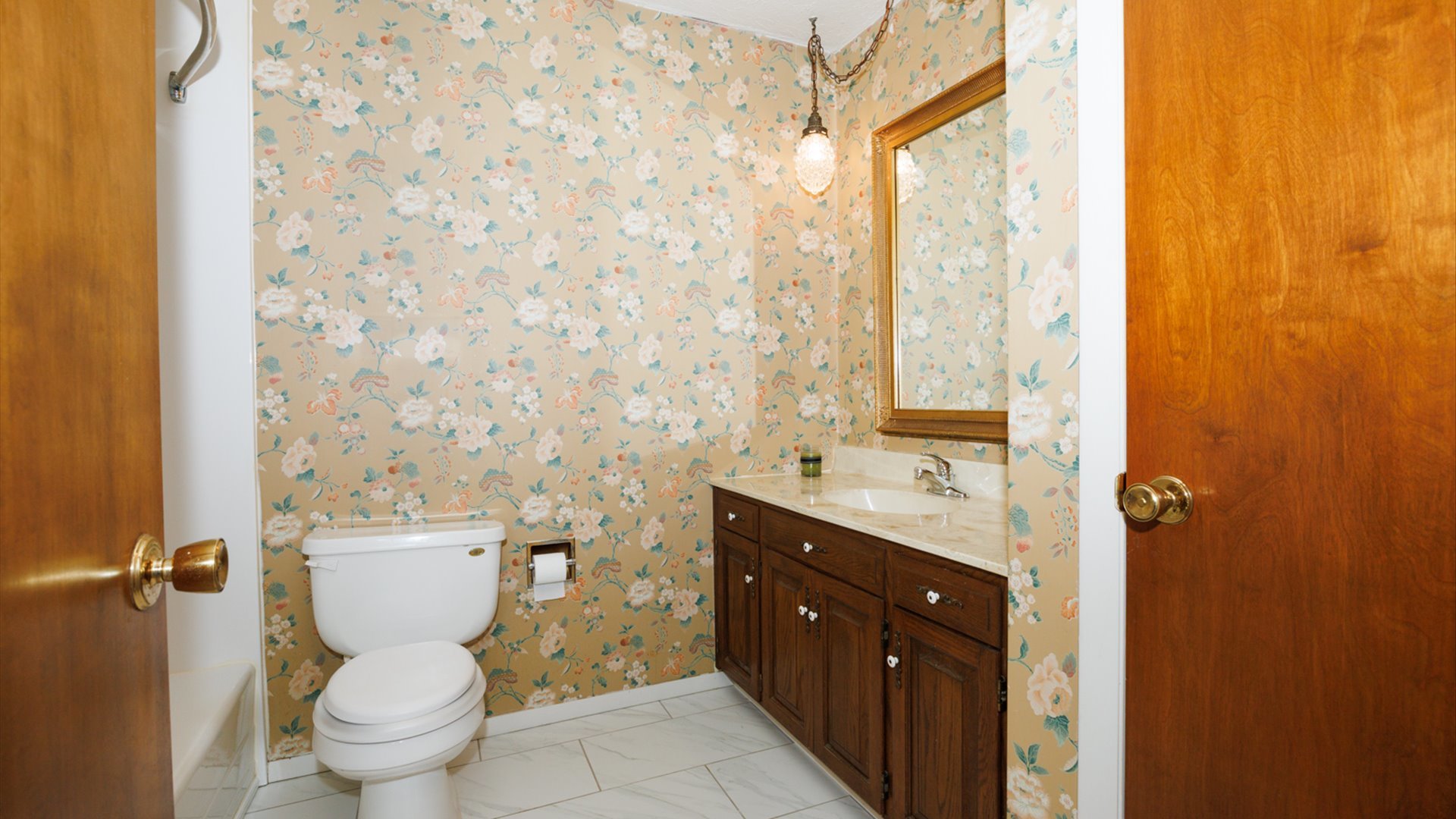 103 Cheltenham Drive Normal, IL 61761 - Photo 6 of 47 a bathroom with a granite countertop toilet a sink and a mirror