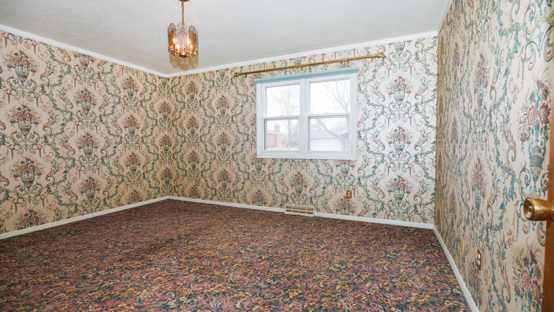 103 Cheltenham Drive Normal, IL 61761 - Photo 7 of 47 a view of an empty room with a window