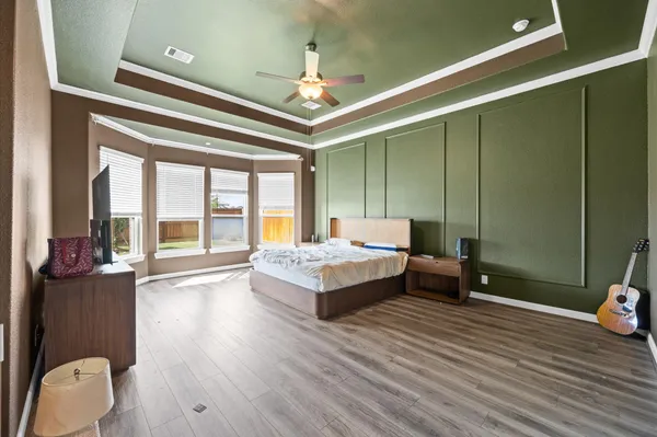 a bathroom with a sink double vanity and a mirror