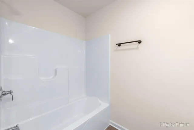 a close up of a bathtub