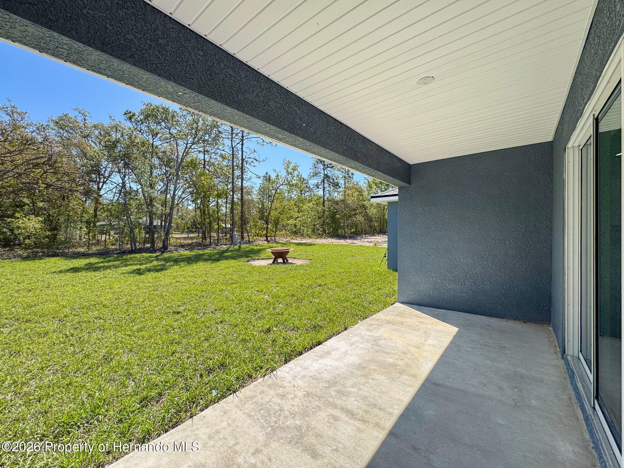 8988 Waterbird Way Weeki Wachee, FL 34613 - Photo 41 of 42 a view of backyard with green space