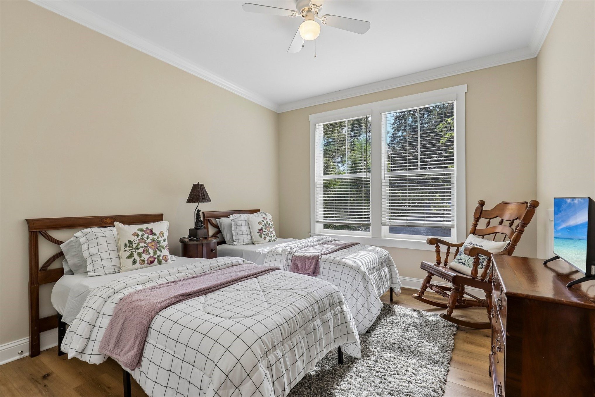 1012 White Street Fernandina Beach, FL 32034 - Photo 29 of 35 a bedroom with two beds and a large window