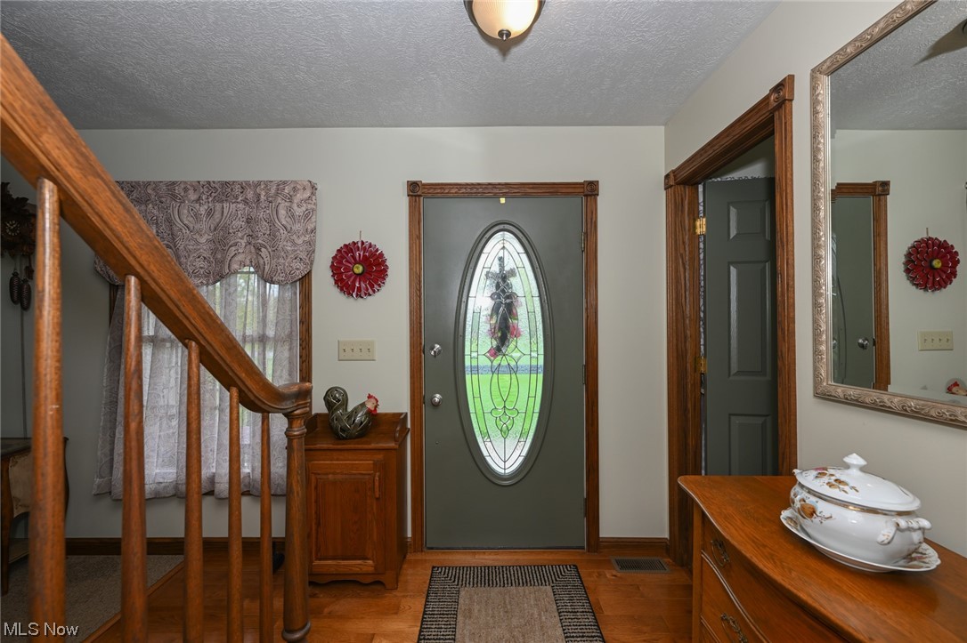 3749 Webb Road Ravenna, OH 44266 - Photo 4 of 31 Foyer with hardwood flooring.