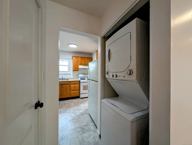 a view of a bathroom with a sink and a mirror