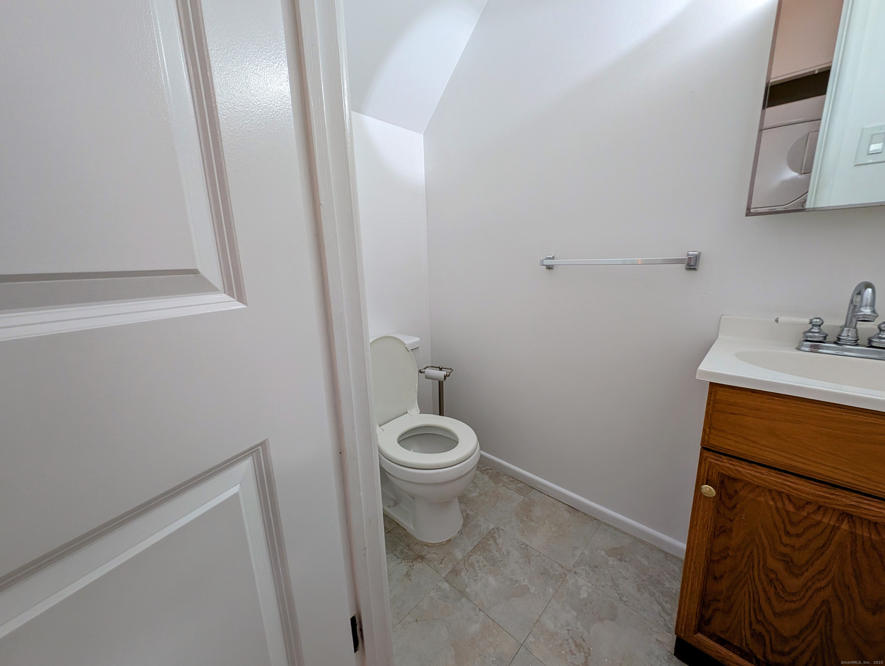 23 Shea Avenue, Unit 23 Milford, CT 06460 - Photo 5 of 16 a bathroom with a toilet and a sink