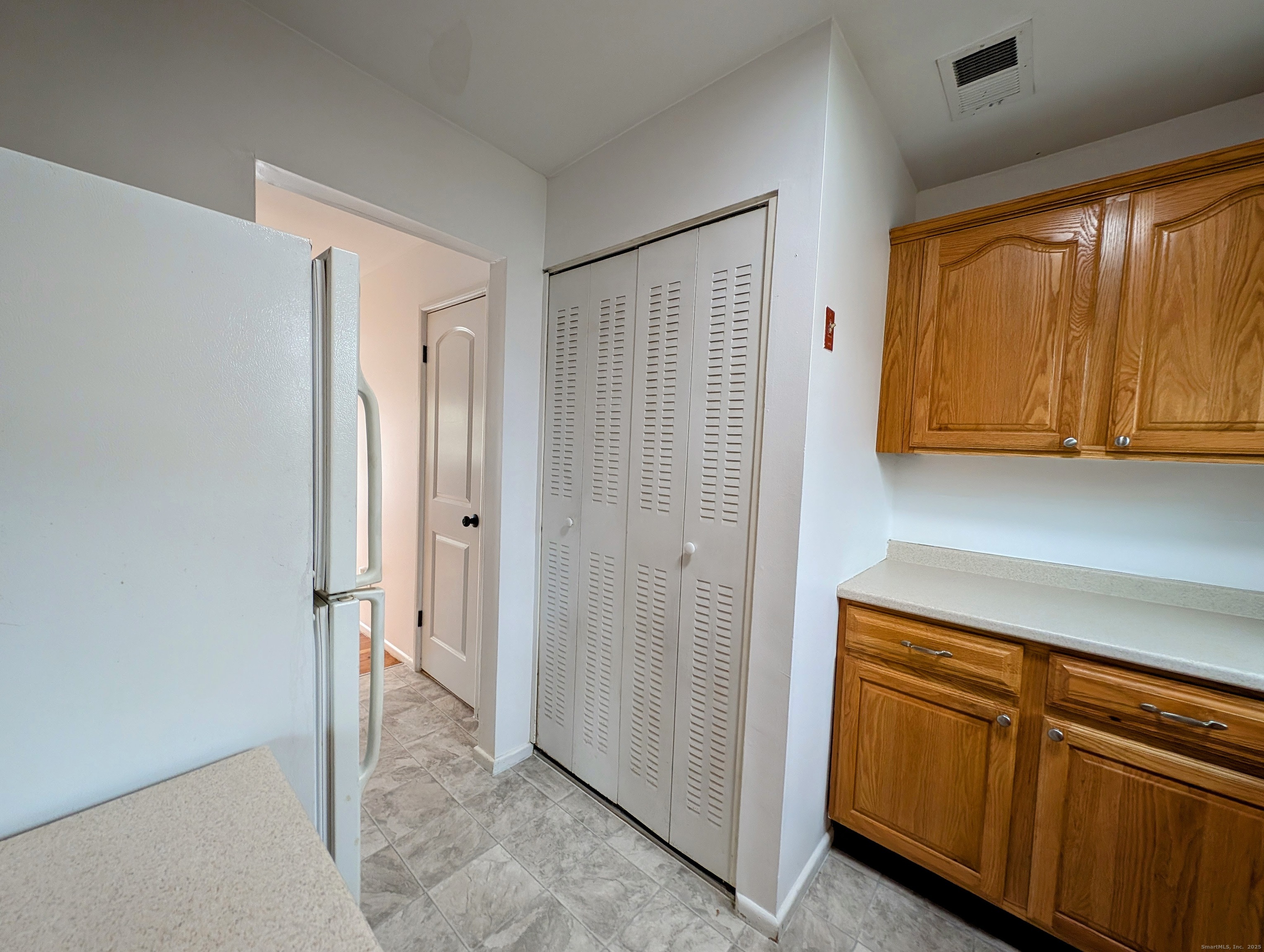23 Shea Avenue, Unit 23 Milford, CT 06460 - Photo 6 of 16 a view of a storage and utility room with window