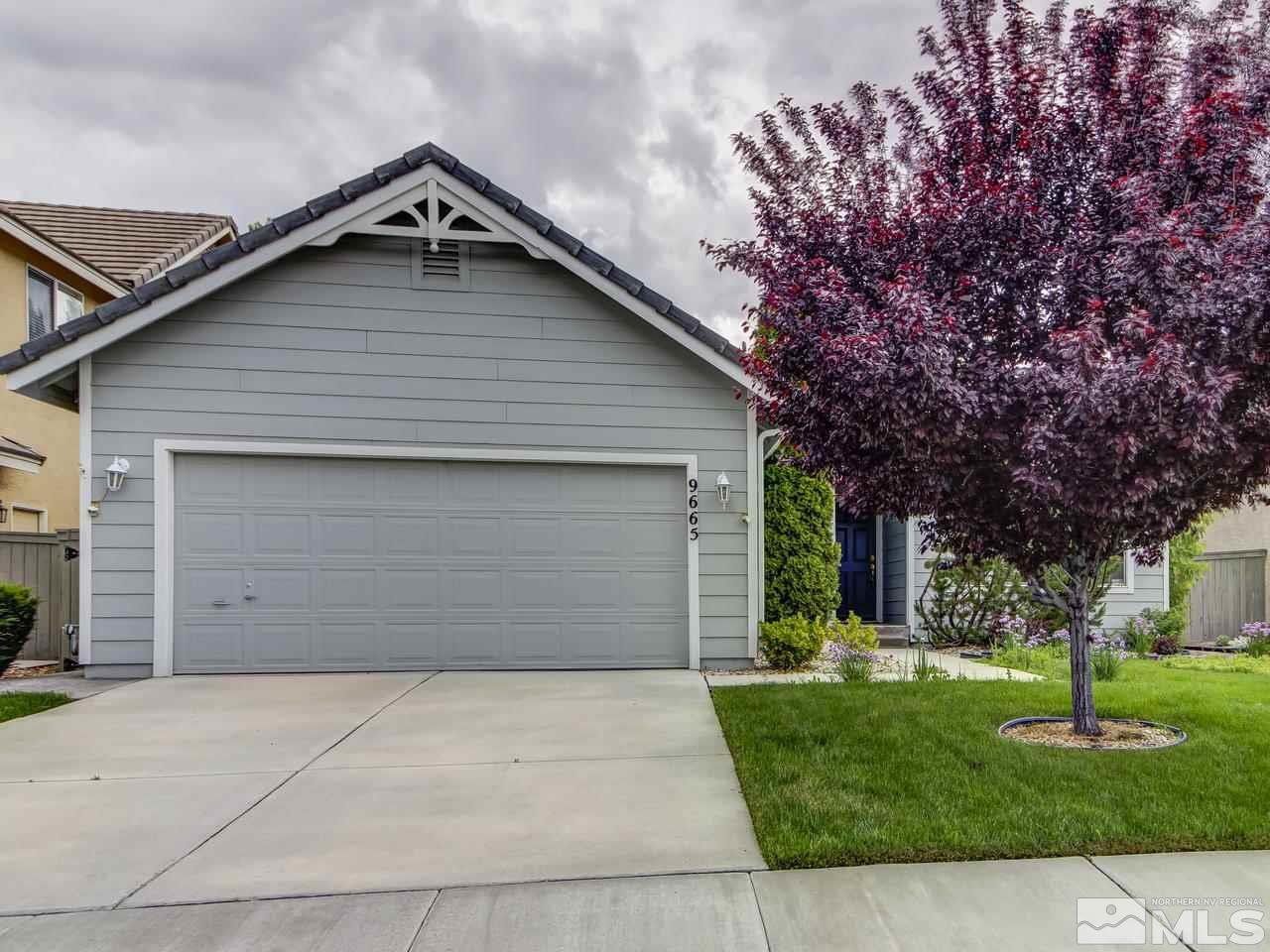 9665 Oakley Lane Reno, NV 89521 - Photo 1 of 23 front view of a house with a yard