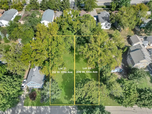 an aerial view of residential house with an outdoor space