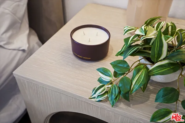 a bed room with a bed and a chair