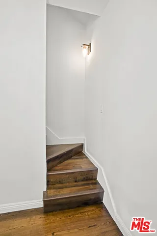 a view of a swimming pool with sitting area