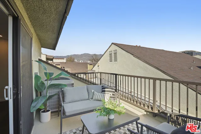 a view of parking garage with cars