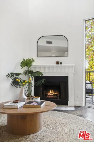 a kitchen with a sink cabinets and dining table
