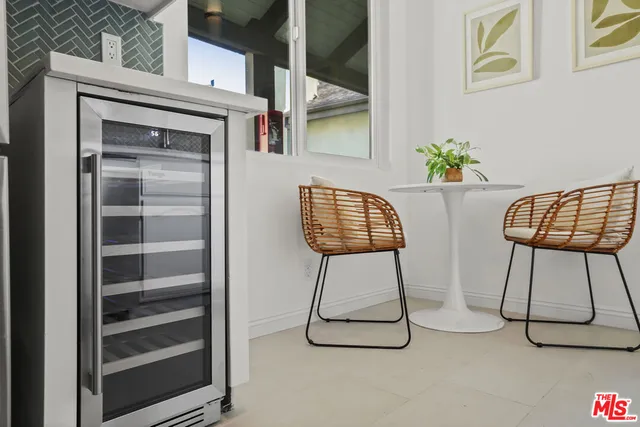 a kitchen with a sink stove and refrigerator