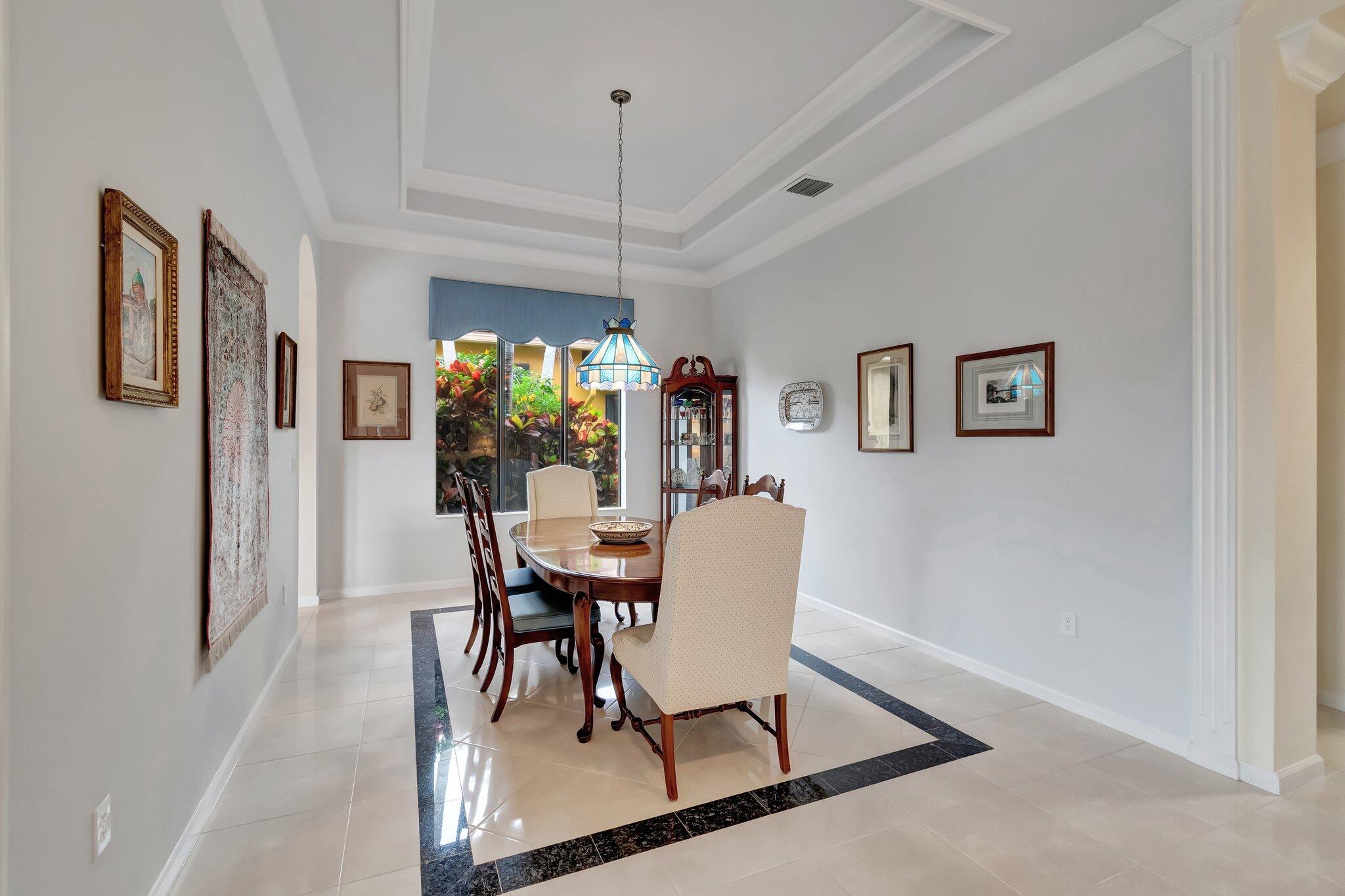 6976 Antinori Lane Boynton Beach, FL 33437 - Photo 19 of 71 a view of a dining room with furniture