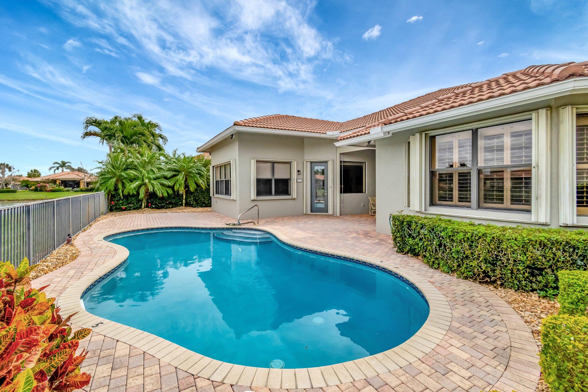 6976 Antinori Lane Boynton Beach, FL 33437 - Photo 2 of 71 a view of a house with swimming pool