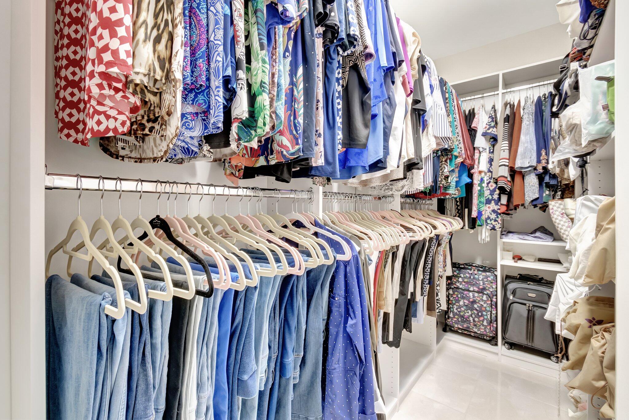 6976 Antinori Lane Boynton Beach, FL 33437 - Photo 31 of 71 a view of walk in closet with clothes and shoes