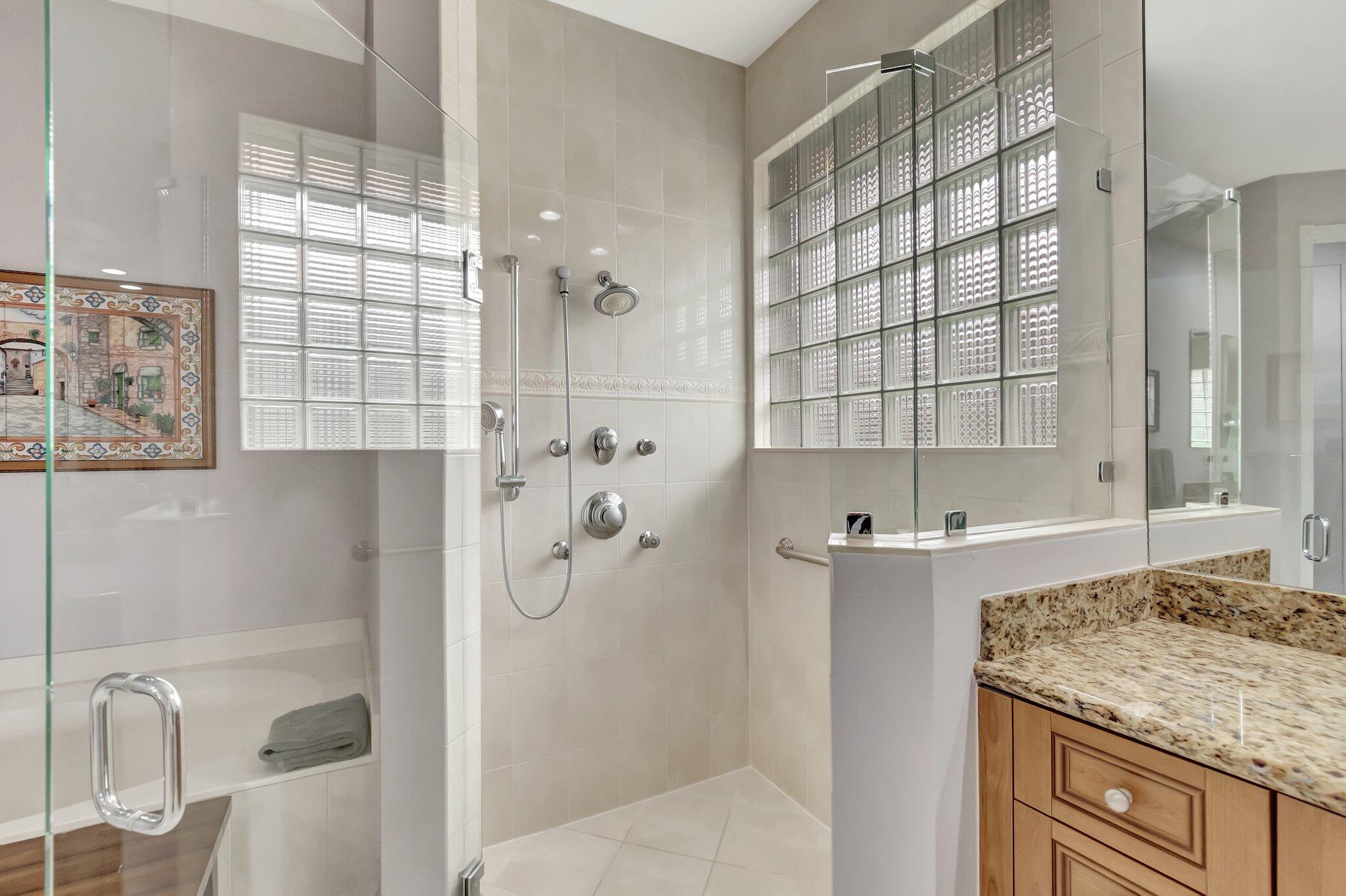 6976 Antinori Lane Boynton Beach, FL 33437 - Photo 35 of 71 a bathroom with a granite countertop shower and a sink