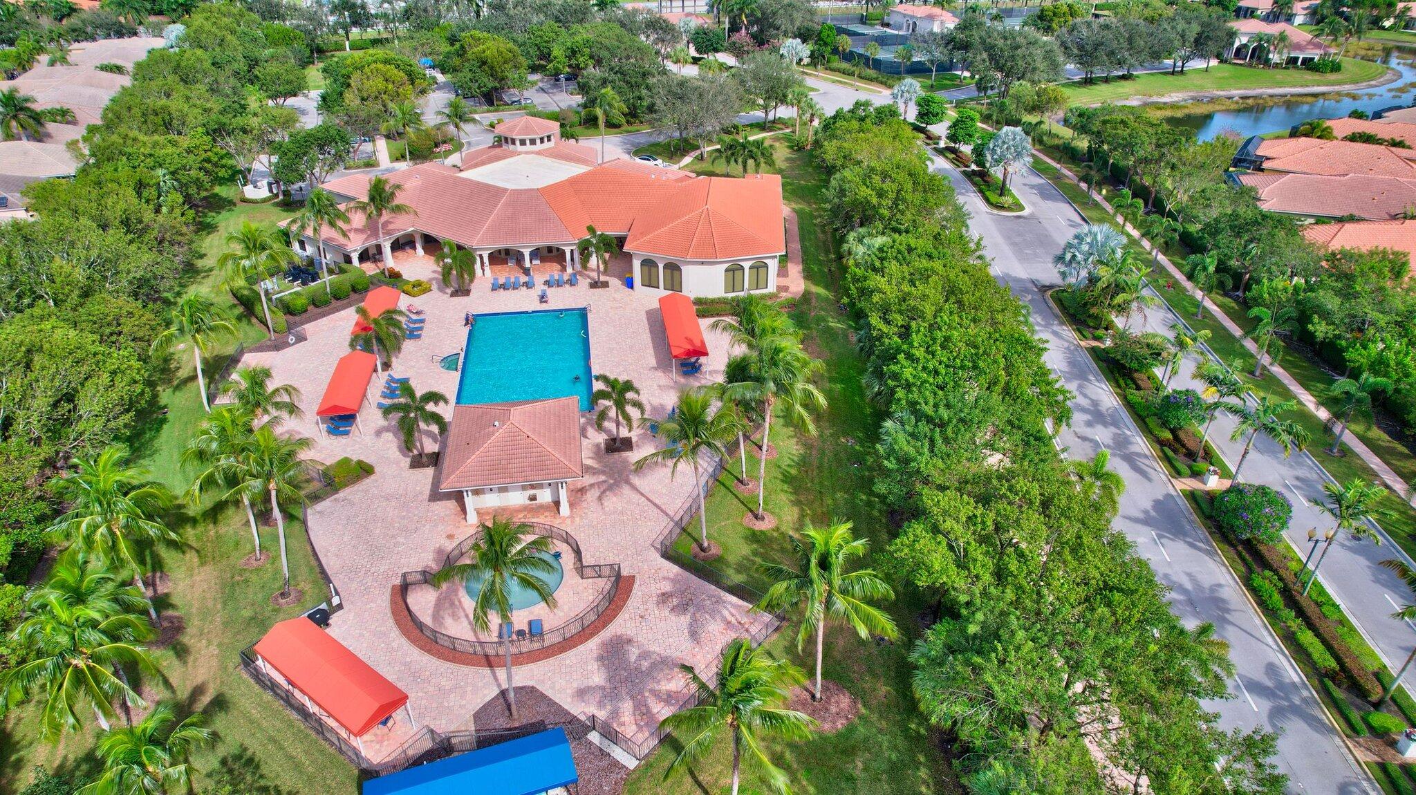 6976 Antinori Lane Boynton Beach, FL 33437 - Photo 49 of 71 an aerial view of a house with yard swimming pool and outdoor seating
