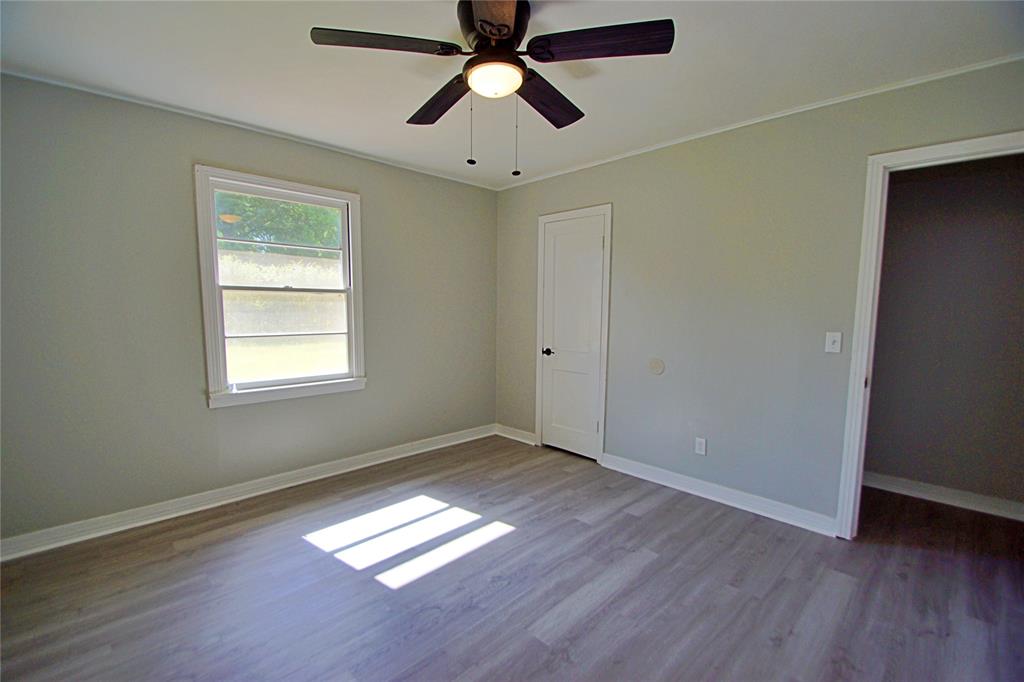 104 Orr Street Sarepta, LA 71071 - Photo 20 of 24 a view of empty room with wooden floor and fan