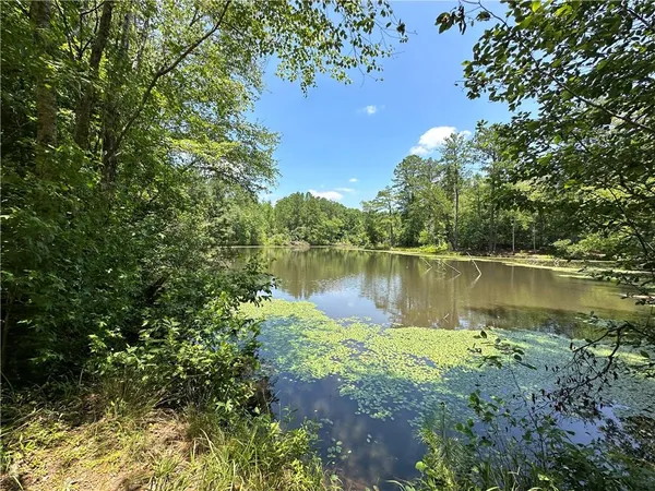 a view of a lake with outdoor space