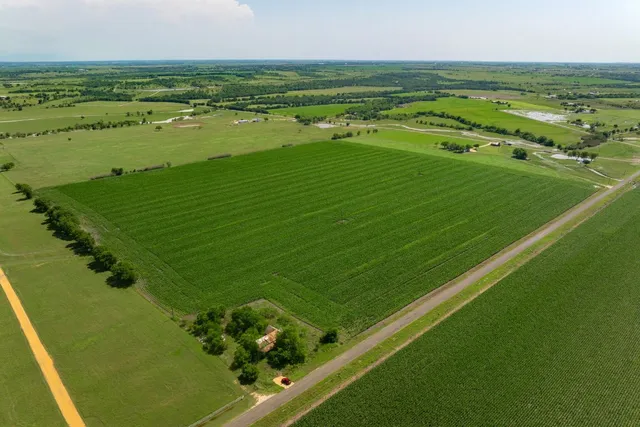 a view of a field with clear sky