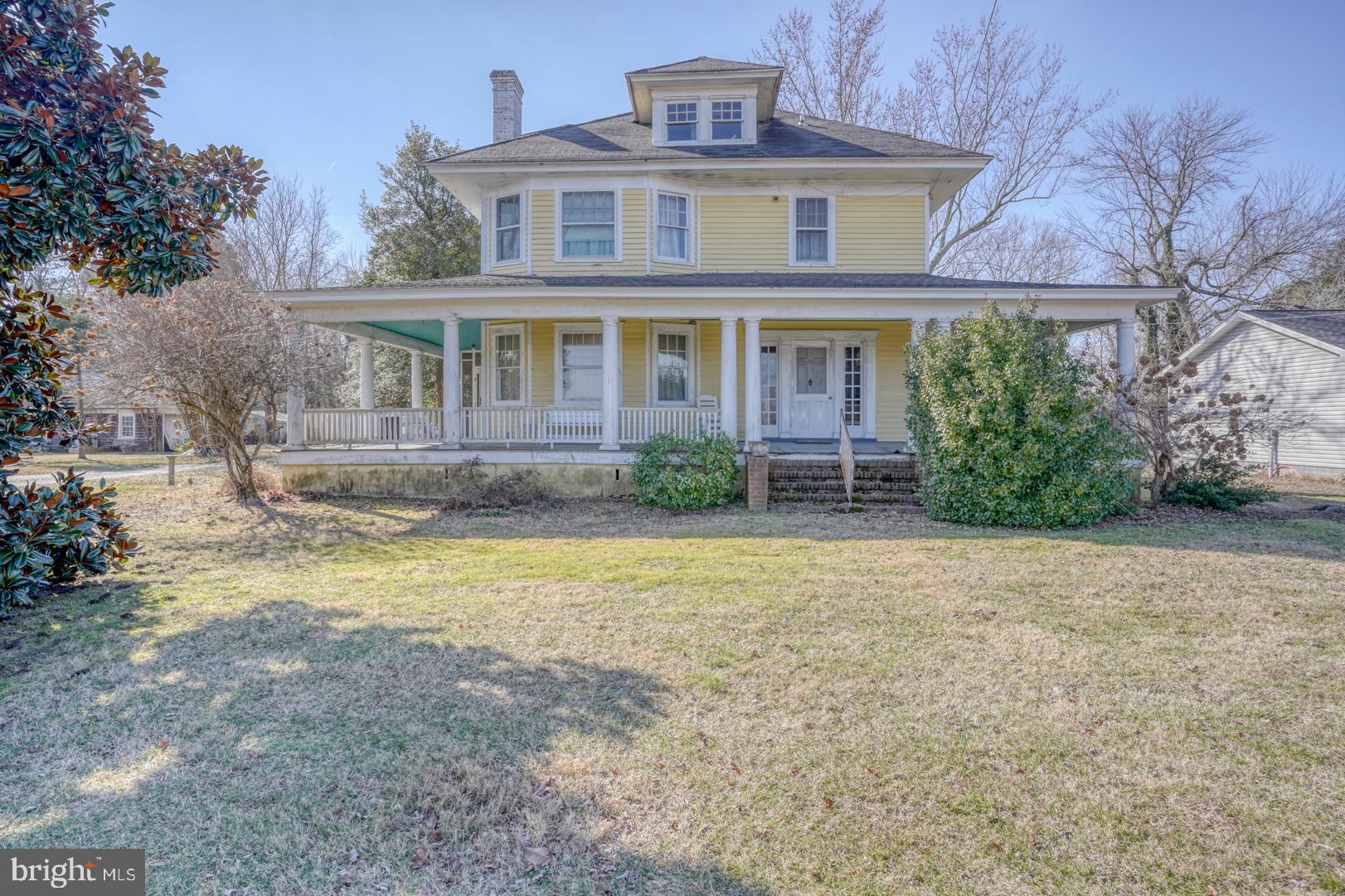 4096 Main Street Trappe, MD 21673 - Photo 3 of 70 a front view of a house with garden