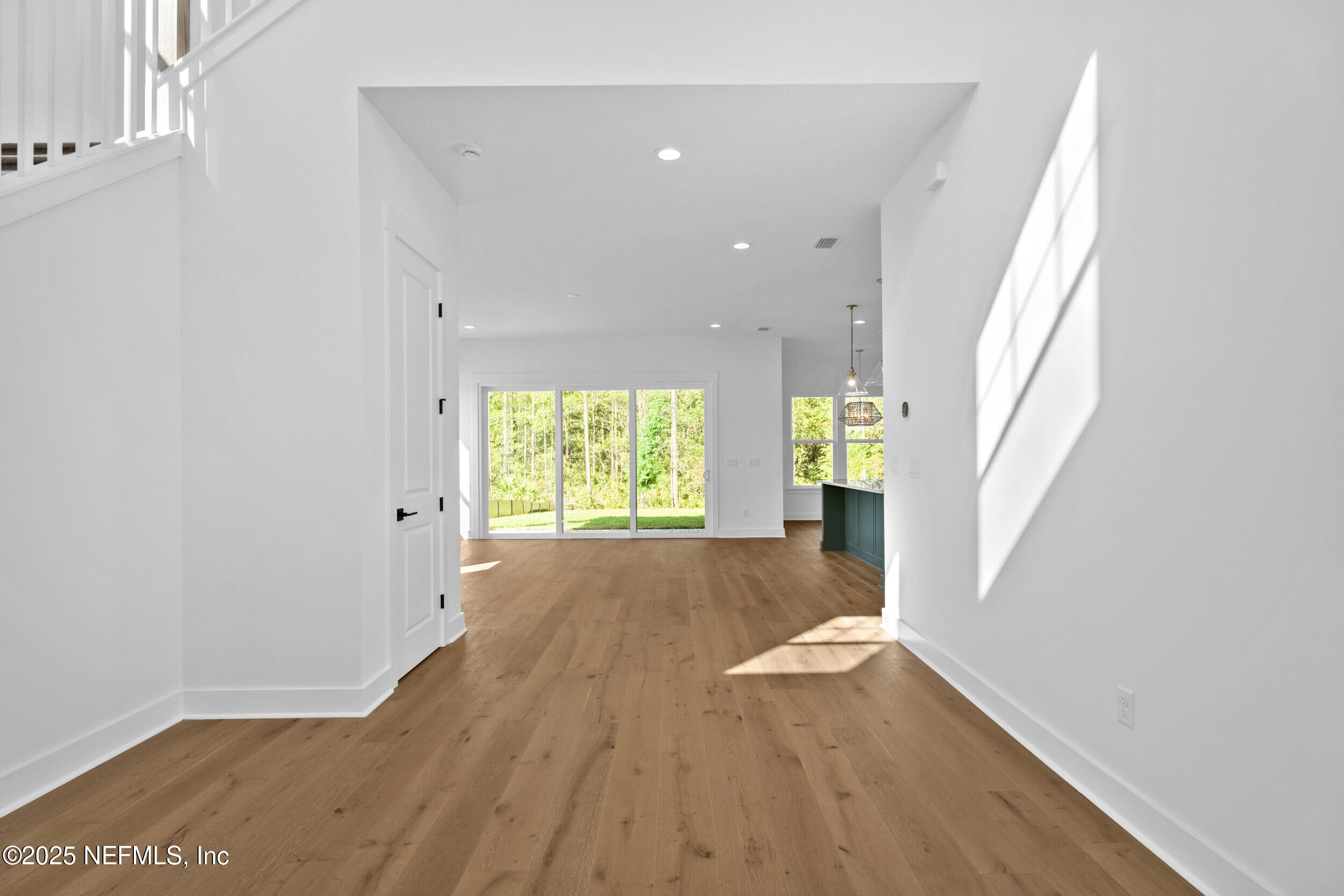 103 Reflections Avenue Ponte Vedra, FL 32081 - Photo 13 of 38 a view of empty room with wooden floor and fan