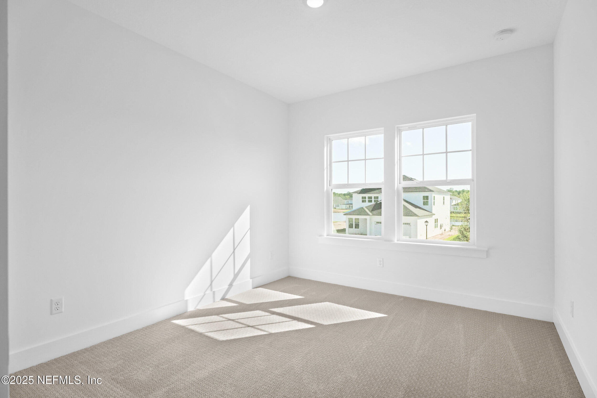 103 Reflections Avenue Ponte Vedra, FL 32081 - Photo 24 of 38 an empty room with windows
