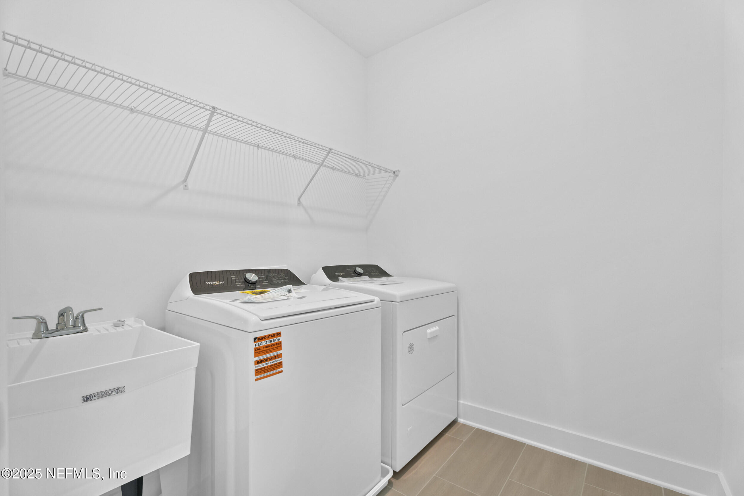103 Reflections Avenue Ponte Vedra, FL 32081 - Photo 34 of 38 a utility room with dryer and washer